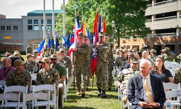 Naval Medical Center Portsmouth (NMCP) hosted the 25th Anniversary celebration of the Charette Health Care Center, or Building 2, April 30. The ceremony began with the posting of the flags of the 50 states.