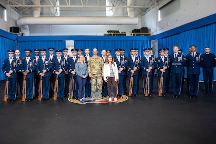 U.S. Air Force Honor Guard poses for group photo with Chief Master Sergeant of the Space and two guests