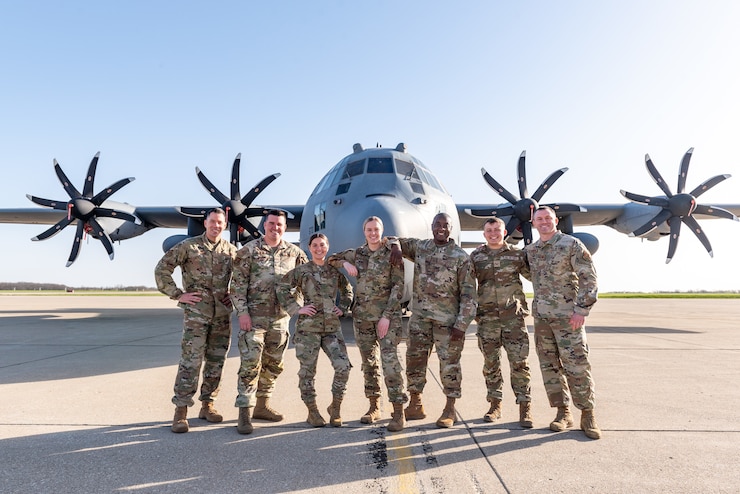 Airmen posing for group photo.