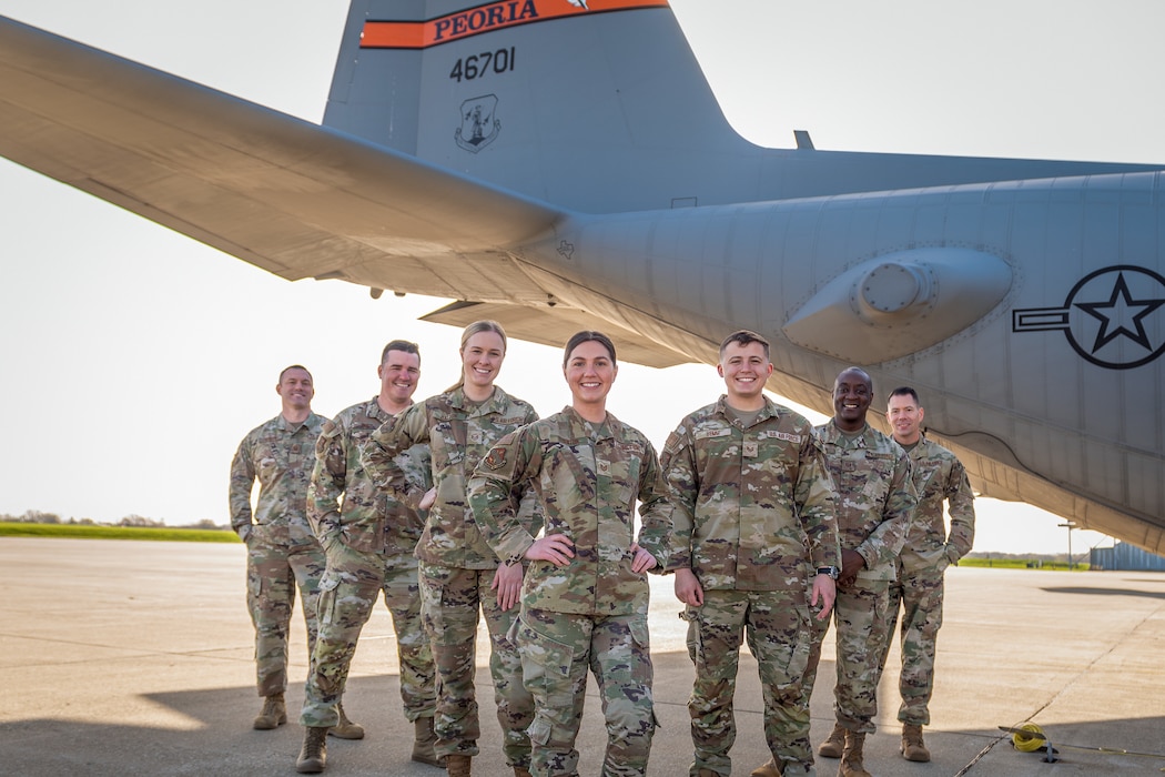 Airmen posing for group photo.