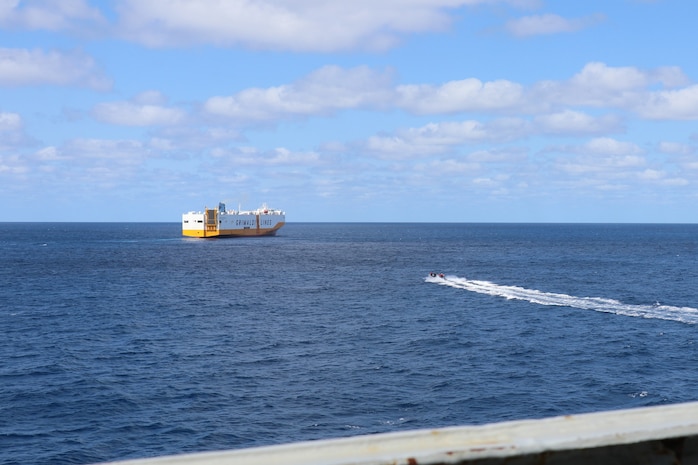 The guided missile destroyer USS Stout (DDG 55) deployes a rigid inflatable boat (RIB) to respond to a a cargo ship requiring medical assistance off the coast of North Carolina.