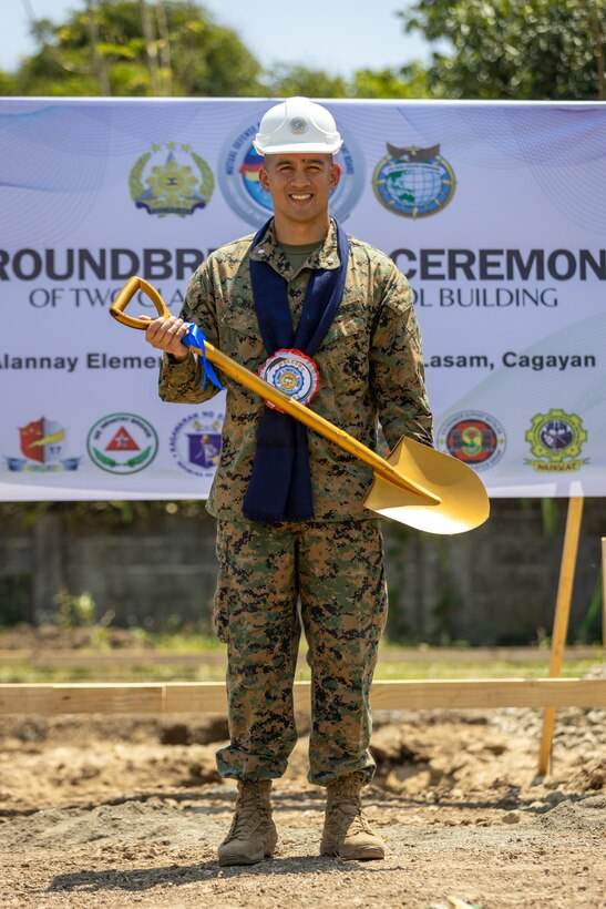 U.S. Marine Corps Lt. Col. Tyrone Barrion, a force engineer with I Marine Expeditionary Force, poses for a photograph at the conclusion of a groundbreaking ceremony at Alannay Elementary School prior to the commencement of Exercise Balikatan 24 in Cagayan, Philippines, March 26, 2024. BK 24 is an annual exercise between the Armed Forces of the Philippines and U.S. military designed to strengthen bilateral interoperability, capabilities, trust, and cooperation built over decades of shared experiences. Barrion is a native of California. (U.S. Marine Corps photo by Cpl. Trent A. Henry)