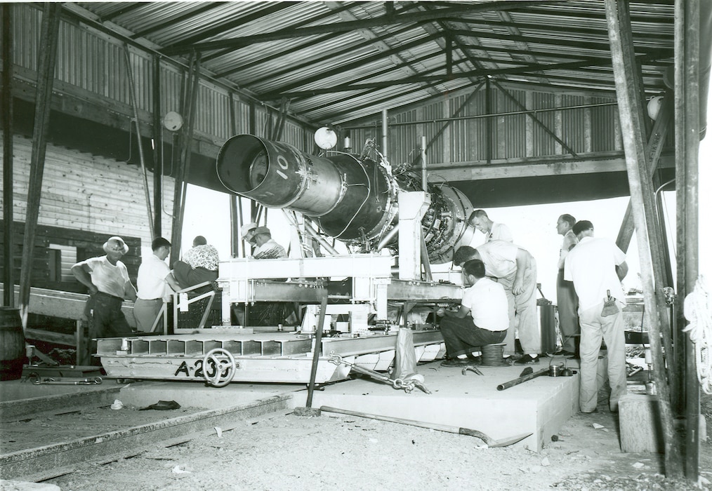 A J47 engine is prepared for open-air testing prior to being test fired on Aug. 27, 1953. This instrumentation test, which occurred near the then-under-construction Engine Test Facility at Arnold Air Force Base, Tenn., was conducted using a specially designed and constructed thrust stand. The first turbojet engine test conducted at Arnold was initiated on May 3, 1954, in the T-1 test cell of the ETF on a J47 engine. (U.S. Air Force photo)