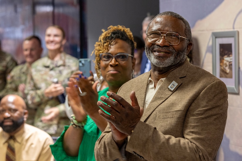 Retired Command Sgt. Maj. Paul L. Morrissette and his wife Renee Warren-Morrissette applaud with other guests during a Finance and Comptroller Hall of Fame induction ceremony at the Soldier Support Institute on Fort Jackson, South Carolina, April 26, 2024. Morrissette, a former Finance Corps regimental sergeant major, was made the third inductee of the hall of fame for his service and commitment to the U.S. Army Finance Corps for more than forty years. (U.S. Army photo by Mark R. W. Orders-Woempner)