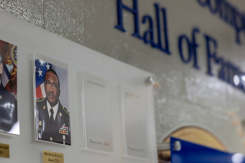 A newly unveiled portrait of retired Command Sgt. Maj. Paul L. Morrissette is seen on the Finance and Comptroller Hall of Fame Wall during an induction ceremony at the Soldier Support Institute on Fort Jackson, South Carolina, April 26, 2024. Morrissette, a former Finance Corps regimental sergeant major, was made the third inductee of the hall of fame for his service and commitment to the U.S. Army Finance Corps for more than forty years. (U.S. Army photo by Mark R. W. Orders-Woempner)