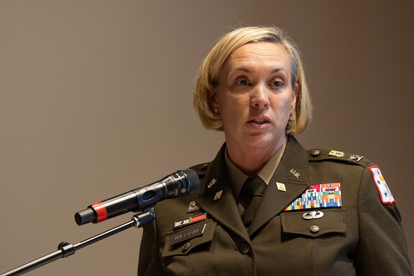 Col. Michelle M. Williams, U.S. Army Finance and Comptroller School commandant and Chief of the Finance Corps, delivers remarks during a Finance and Comptroller Hall of Fame induction ceremony at the Soldier Support Institute on Fort Jackson, South Carolina, April 26, 2024. Retired Command Sgt. Maj. Paul L. Morrissette, a former Finance Corps regimental sergeant major, was made the third inductee of the hall of fame for his service and commitment to the U.S. Army Finance Corps for more than forty years. (U.S. Army photo by Mark R. W. Orders-Woempner)