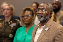 From right to left, retired Command Sgt. Maj. Paul L. Morrissette, his wife Renee Warren-Morrissette, and Col. Michelle M. Williams, U.S. Army Finance and Comptroller School commandant and Chief of the Finance Corps, sing the Army Song along with other guests during a Finance and Comptroller Hall of Fame induction ceremony at the Soldier Support Institute on Fort Jackson, South Carolina, April 26, 2024. Morrissette, a former Finance Corps regimental sergeant major, was made the third inductee of the hall of fame for his service and commitment to the U.S. Army Finance Corps for more than forty years. (U.S. Army photo by Mark R. W. Orders-Woempner)