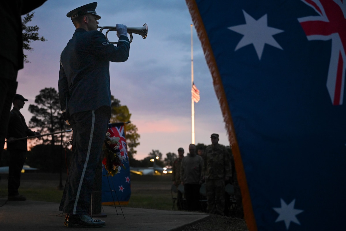 Airman 1st Class Wyatt Losey, a Little Rock Air Force Base Honor Guardsman, performs ‘The Last Post’ during Anzac Day at Little Rock Air Force Base, Ark., April 25, 2024.