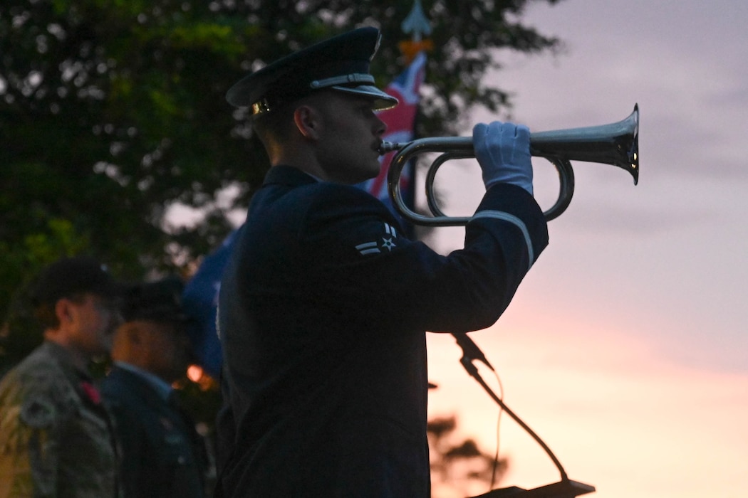 Airman 1st Class Wyatt Losey, a Little Rock Air Force Base Honor Guardsman, performs ‘The Last Post’ during Anzac Day at Little Rock Air Force Base, Ark., April 25, 2024.