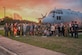 Members of the Royal New Zealand Air Force, families and friends stand together for a group photo during Anzac Day at Little Rock Air Force Base, Ark., April 25, 2024. ANZAC Day is observed each year on April 25 across New Zealand and Australia as a national day of remembrance for service members during all wars, conflicts, and peacekeeping operations. (U.S. Air Force photo by Airman 1st Class Saisha Cornett)