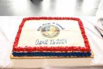 A cake rests on a table.