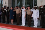Distinguished guest and host of African Maritime Forces Summit and Naval Infantry Leadership Symposium - Africa (AMFS/NILS-A) salute the arrival of President of the Republic of Ghana, at the African Maritime Forces Summit and Naval Infantry Leadership Symposium - Africa (AMFS/NILS-A) 2024 in Accra, Ghana, on April 30, 2024. AMFS/NILS-A is a multinational, Africa-focused, strategic-level forum designed to address transnational maritime security challenges in African waters, bringing together partner nations with marine forces and naval . infantry to develop interoperability, crisis response capabilities, and foster relationships that will improve Africa's maritime domain security. (U.S. Marine Corps photo by Cpl. Addysyn Tobar)