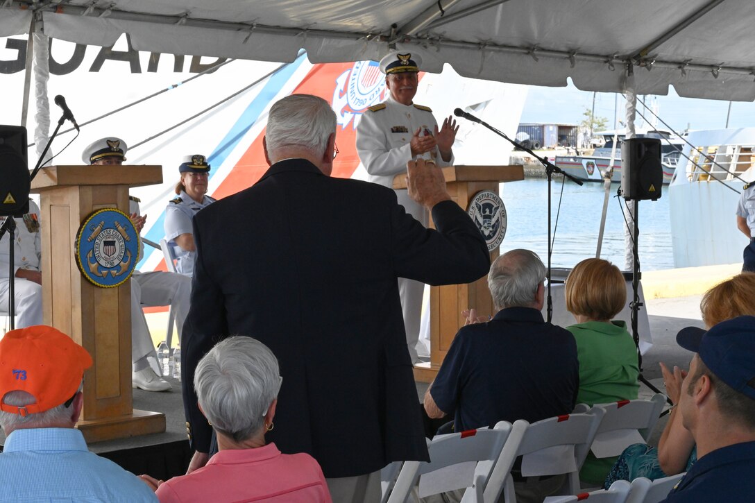 A former commanding officer of U.S. Coast Guard Cutter Confidence (WMEC 619) is recognized, May 2, 2024, during the cutter's heritage recognition ceremony in Cape Canaveral, Florida. Confidence was recognized for 58 years of service to the nation in the presence of current and former crew members, family, and friends before it was placed in commission, special status. (U.S. Coast Guard photo by Petty Officer 2nd Class Brandon Hillard)