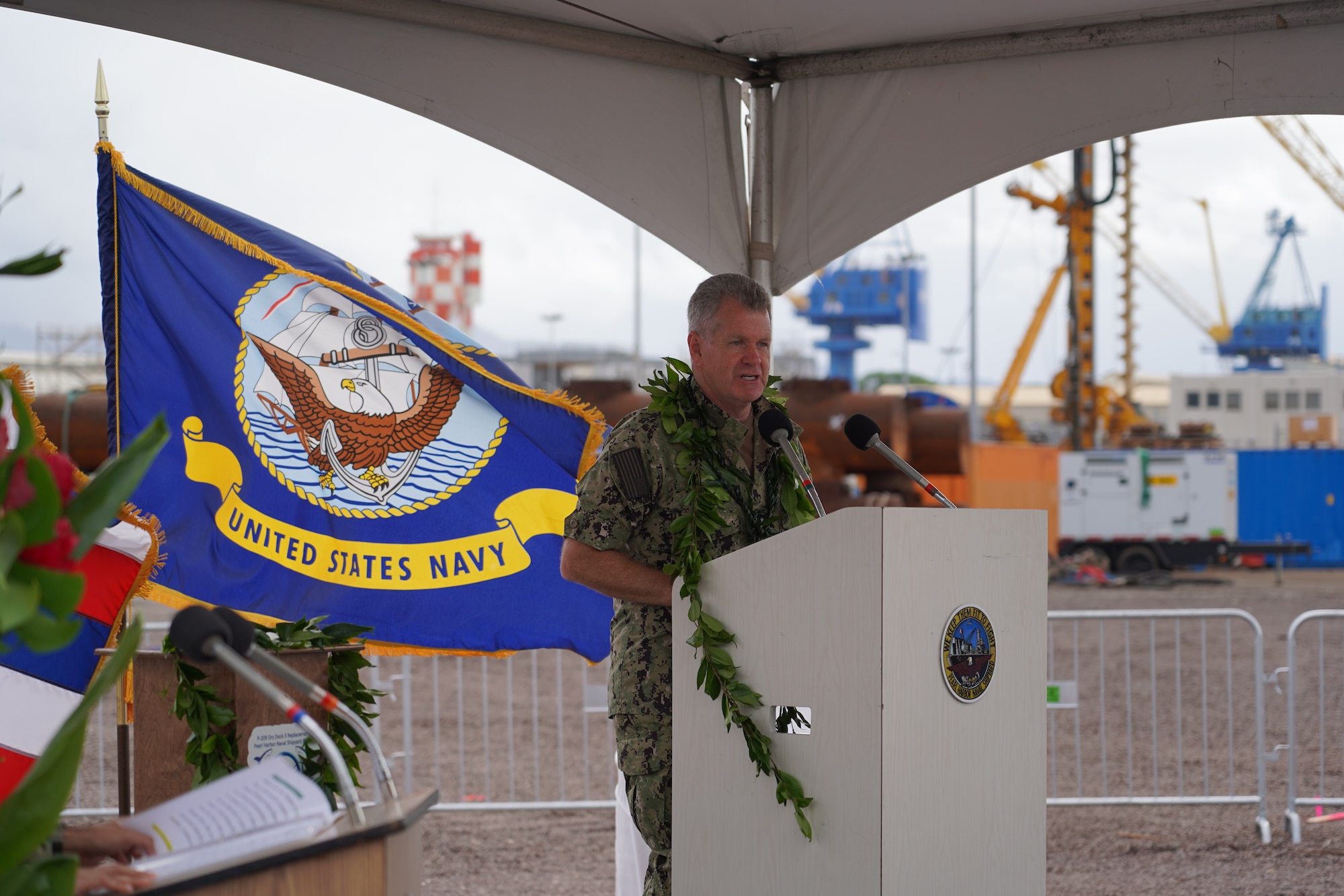 240224-N-EL904-0011 PEARL HARBOR, Hawaii – Adm. Samuel Paparo, Commander, U.S. Pacific Fleet, provides remarks at the Pearl Harbor Naval Shipyard & Intermediate Maintenance Facility (PHNSY & IMF) Dry Dock 5 Anchoring Ceremony Feb. 24, 2024. The ceremony celebrated an early construction milestone, marking the installation of piles that will anchor the foundational footprint of Dry Dock 5 at PHNSY & IMF. This is the first graving dock built in Pearl Harbor since 1943 and the highest-value single construction project in the history of the Navy. The new dry dock will enhance PHNSY & IMF’s mission to repair, maintain, and modernize Navy fast-attack submarines and surface ships, keeping them Fit to Fight. U.S. Navy photo by Justice Vannatt