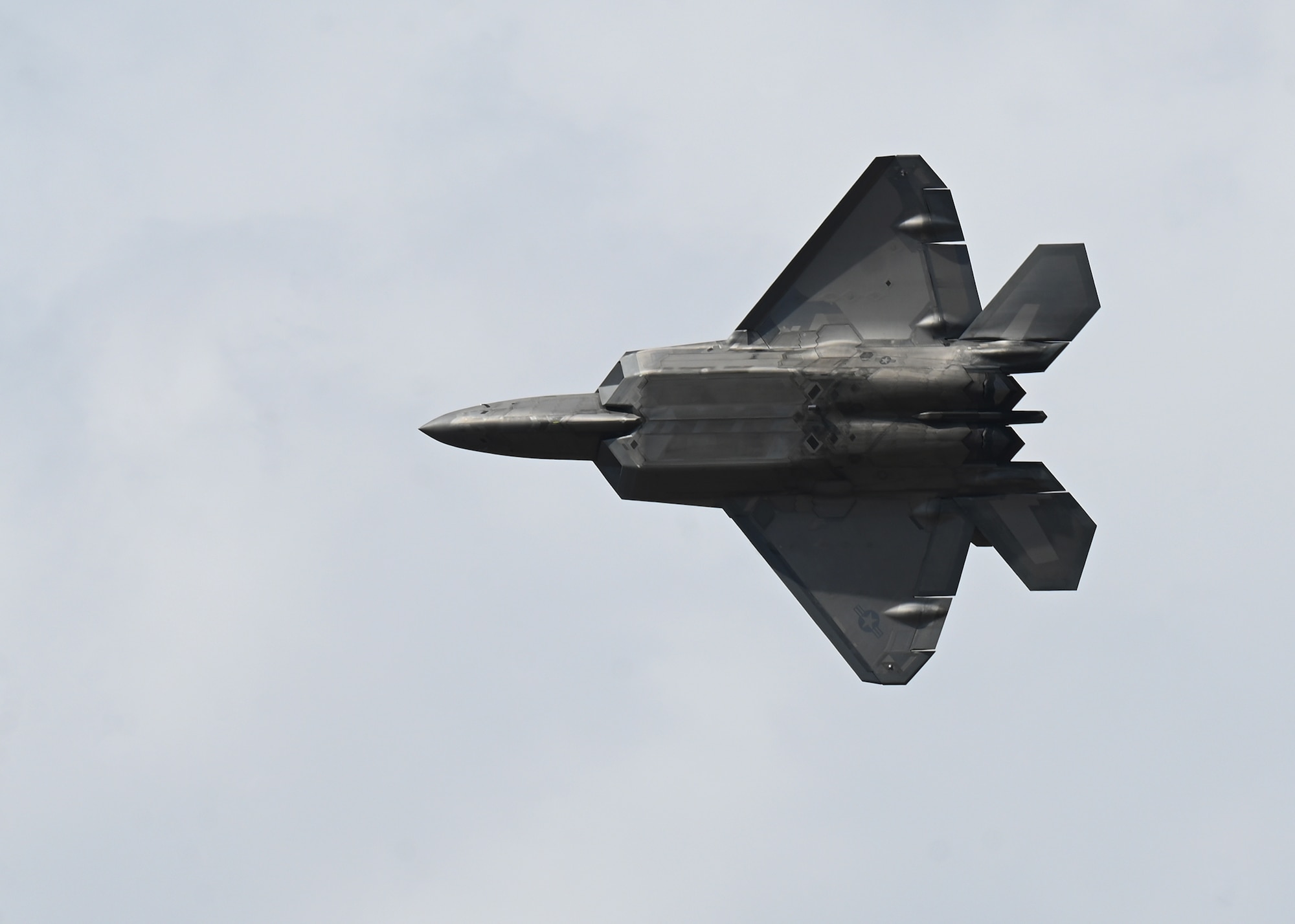 F-22 Raptor Demonstration Team commander and pilot, performs an aerial maneuver during the Feria Internacional del Aire y del Espacio international air and space show, at Pudahuel Air Base, Chile.