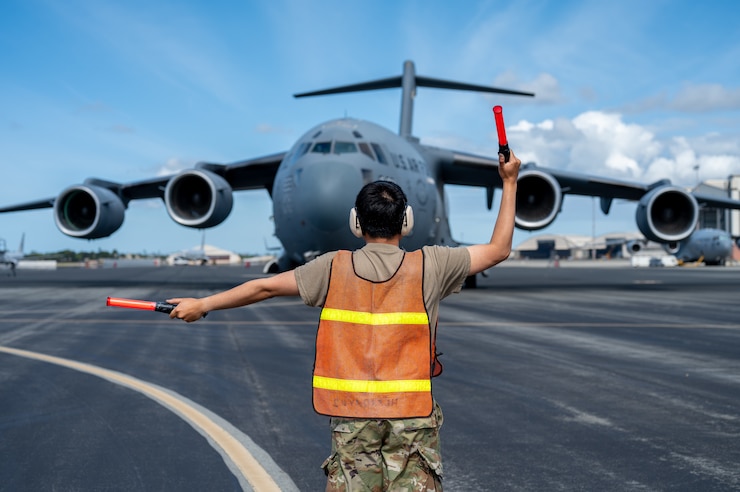 Airmen taxis a C-17 Globemaster III aircraft.