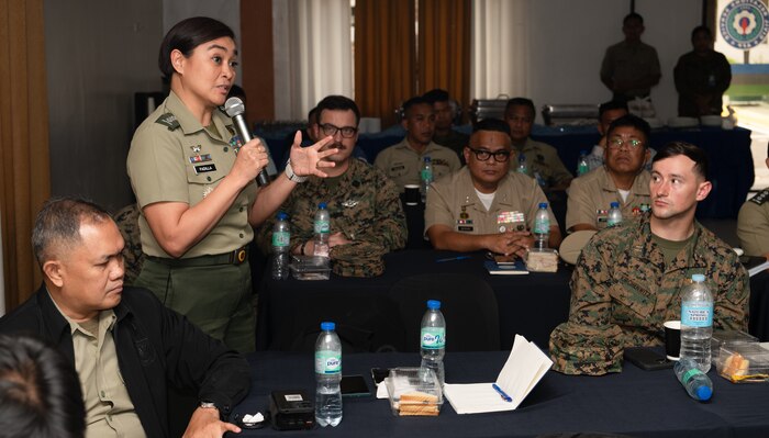Armed Forces of the Philippines Spokesperson Col. Francel Padilla-Taborlupa, speaks on the topic of civil affairs’ role in national defense matters during a Civil-Military Operations subject matter expert exchange as part of Exercise Balikatan 24 at Camp Aguinaldo, Manila, Philippines, April 29, 2024. AFP and U.S. CMO specialists joined together to share the best civil affairs practices and their experiences when military forces were called to support civilian populations during the COVID-19 pandemic, natural disasters, and refugee crises. BK 24 is an annual exercise between the Armed Forces of the Philippines and the U.S. military designed to strengthen bilateral interoperability, capabilities, trust, and cooperation built over decades of shared experiences. (U.S. Air Force photo by Staff Sgt. Pedro Tenorio)