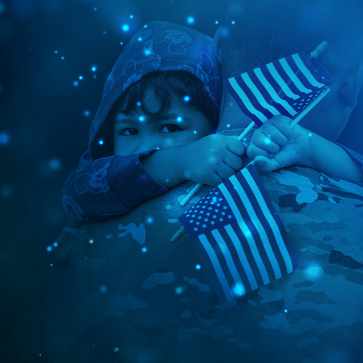 Military member returning from deployment carrying and hugging his child [image is not public domain].