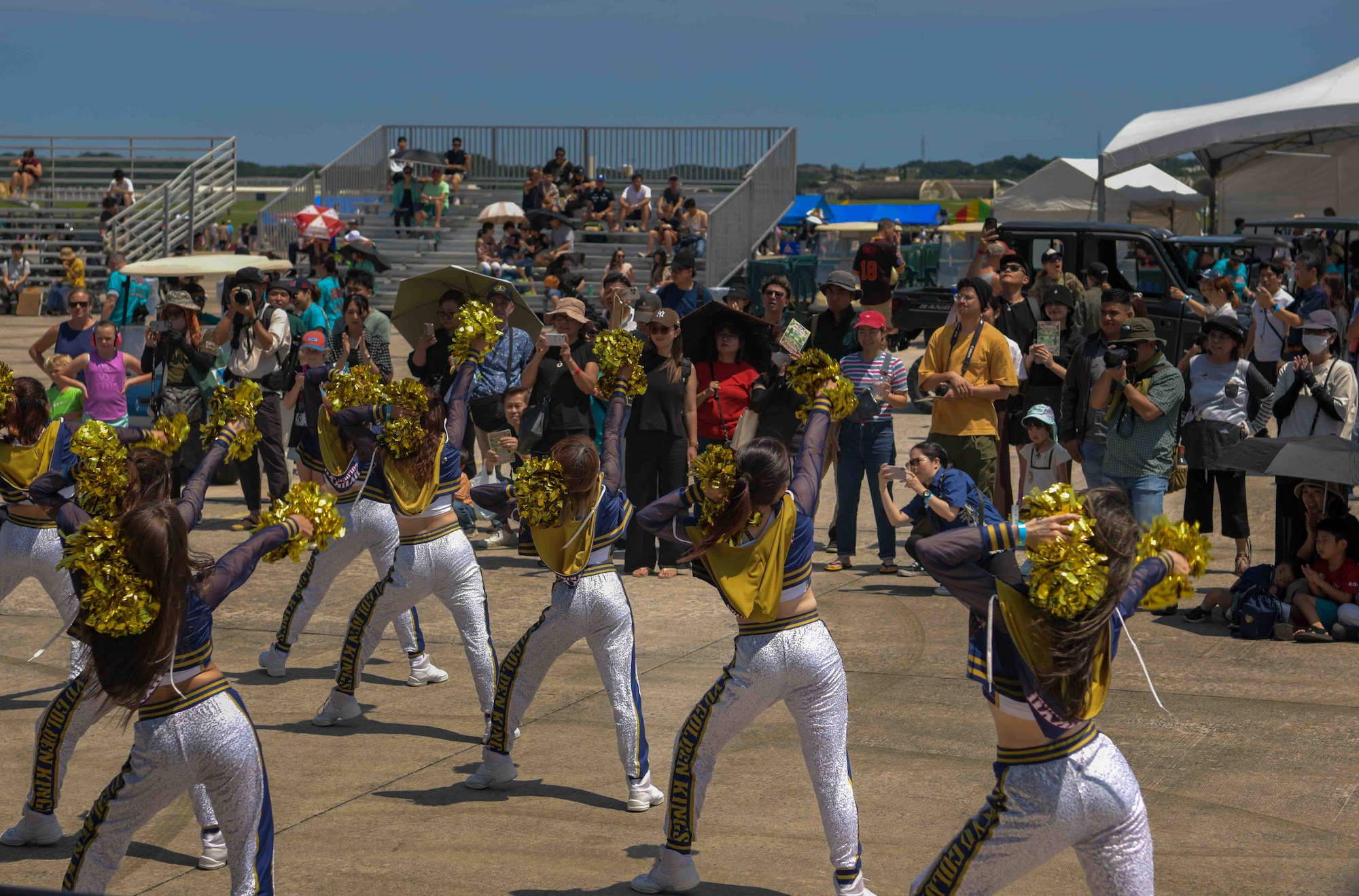 The Ryukyu Kings cheer squad performs a routine during America Fest at Kadena Air Base, Japan, April 27, 2024.