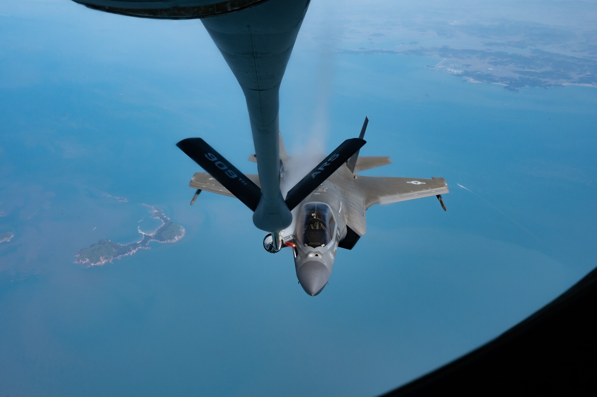 A U.S. Marine Corps F-35B Lightning II assigned to Marine Fighter Attack Squadron 121, Marine Corps Air Station Iwakuni, Japan, conducts aerial refueling with a KC-135 Stratotanker assigned to the 909th Air Refueling Squadron, Kadena Air Base, Japan, during Korea Flying Training 24 over the Republic of Korea, April 25, 2024.