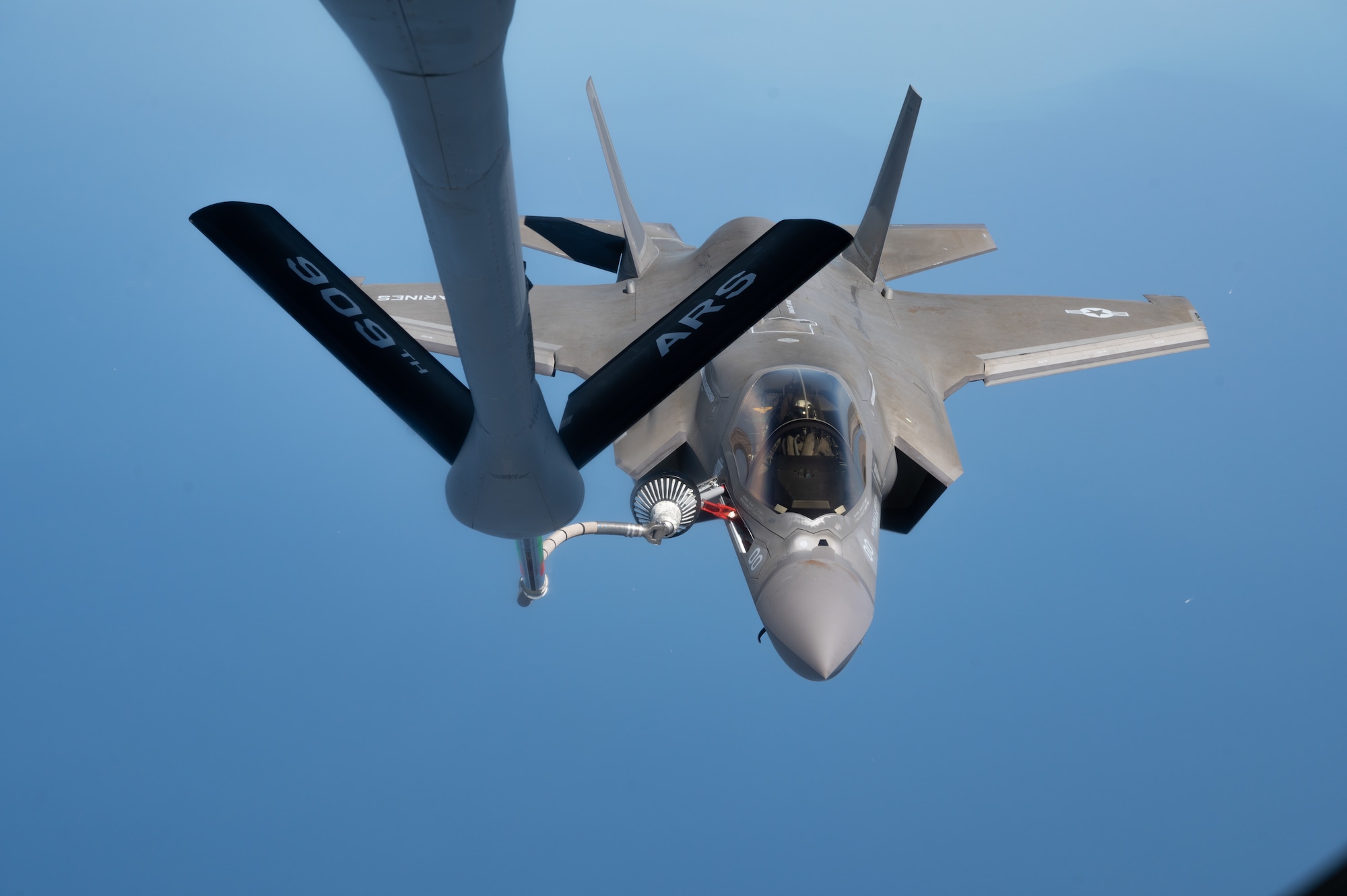 A U.S. Marine Corps F-35B Lightning II assigned to Marine Fighter Attack Squadron 121, Marine Corps Air Station Iwakuni, Japan, conducts aerial refueling with a KC-135 Stratotanker assigned to the 909th Air Refueling Squadron, Kadena Air Base, Japan, during Korea Flying Training 24 over the Republic of Korea, April 25, 2024.