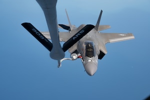 A U.S. Marine Corps F-35B Lightning II assigned to Marine Fighter Attack Squadron 121, Marine Corps Air Station Iwakuni, Japan, conducts aerial refueling with a KC-135 Stratotanker assigned to the 909th Air Refueling Squadron, Kadena Air Base, Japan, during Korea Flying Training 24 over the Republic of Korea, April 25, 2024.