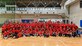 Varsity volleyball members across the U.S. Indo-Pacific Command area of responsibility gather for a group photo during the 2024 INDOPACOM Volleyball Tournament at Yokota Air Base, Japan, April 27, 2024. 34 members formed four teams and represented Osan AB, Republic of Korea, participating in the U.S. Indo-Pacific Command tournament hosted by Yokota AB. Leading up to the tournament, the Osan AB Varsity Volleyball team put in hours of practice weekly over several months to prepare them for the competition. (U.S. Air Force photo by Staff Sgt. Aubree Owens)