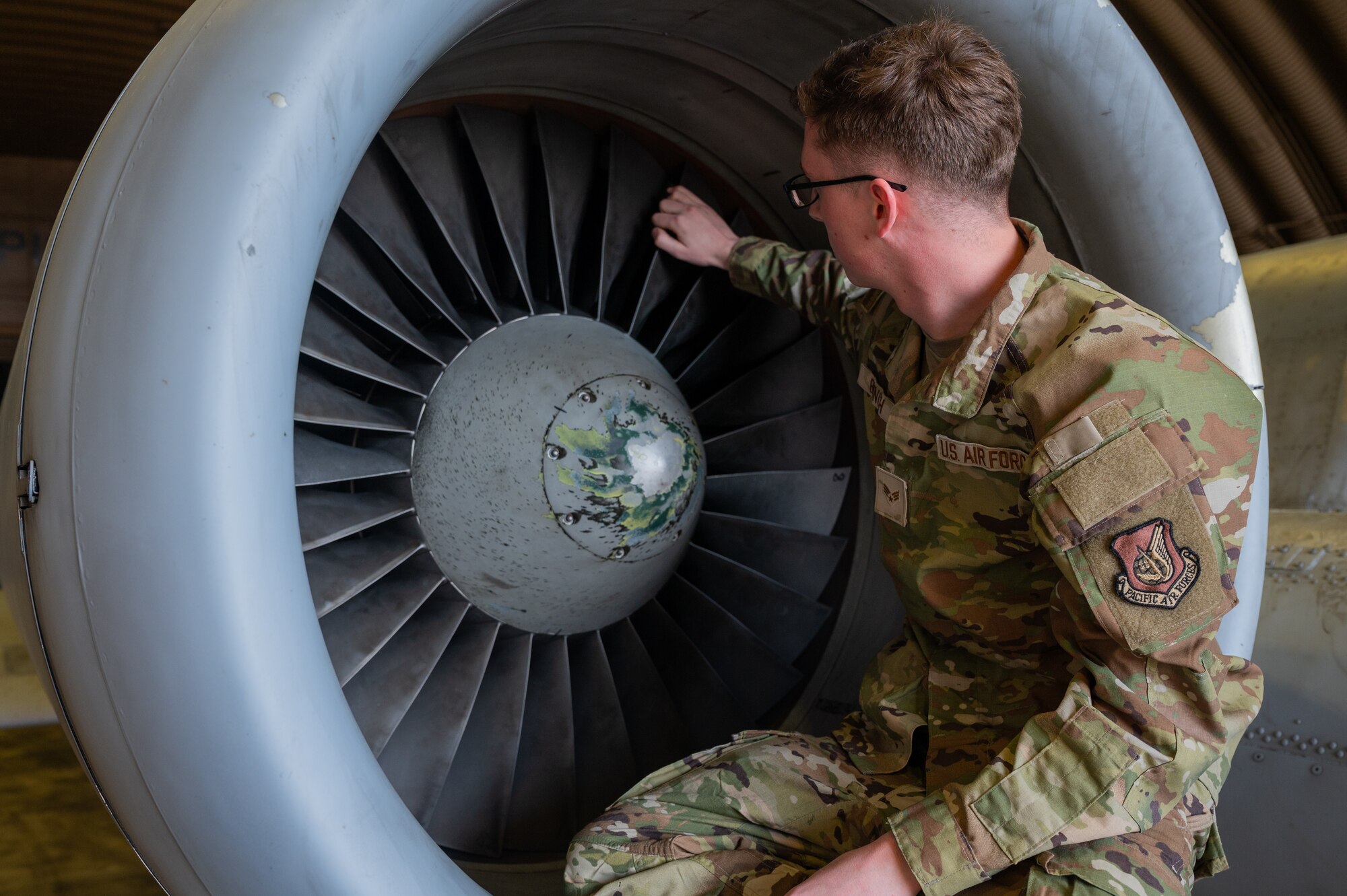 U.S. Air Force Senior Airman Aron Bunch, 25th Fighter Generation Squadron aerospace propulsion journeyman, inspects fan blades of an A-10C Thunderbolt II engine at Osan Air Base, Republic of Korea, May 3, 2024. Bunch was recognized in the 25th FGS for mentoring new Airmen in his shop and providing oversight for the on-the-job training for more than 15 Airmen. (U.S. Air Force photo by Airman 1st Class Chase Verzaal)