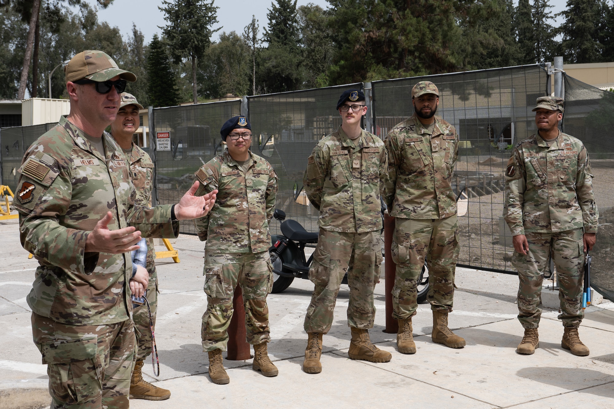 U.S. Air Force Chief Master Sgt. Kevin Helms, 39th Air Base Wing command chief speaks to a group of other members and personnel.