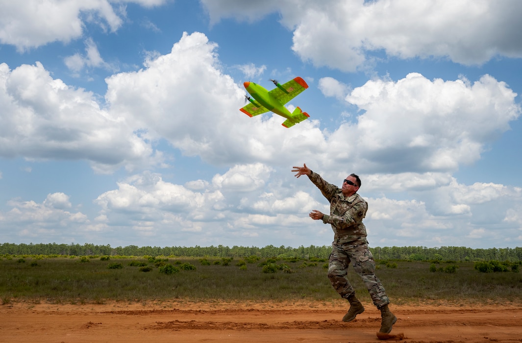 Col. Dustin Thomas launches a 3D-printed unmanned aerial system