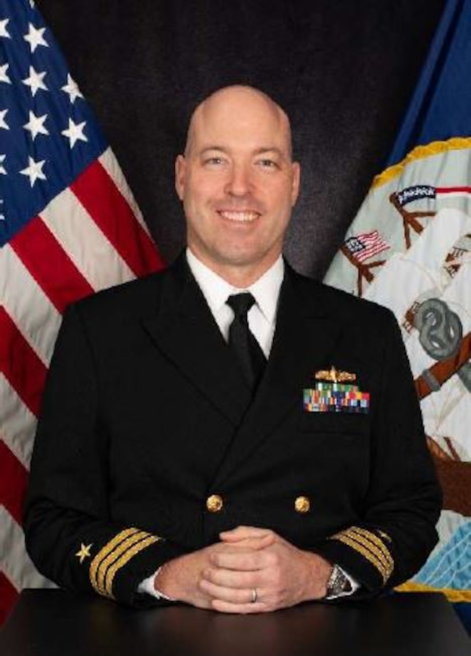 Cmdr. Michael R. Schelcher
