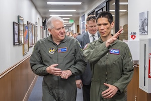 Col. James Valpiani, Air Force Test Pilot School commandant, provides final points of instruction to Secretary of the Air Force Frank Kendall during his visit to Edwards Air Force, California, May 2. Kendallk experienced the future of flight as he flew aboard the X-62 VISTA. (Air Force photo by James West)