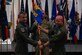 U.S. Air Force Col. Andrew Finkler, 850th Spectrum Warfare Group commander, left, passes the squadron guidon to Lt. Col. Timothy West, 388th Electronic Warfare Squadron commander, right, during a reactivation ceremony and assumption of command at the U.S. Air Force Armament Museum, Eglin Air Force Base, Florida, May 2, 2024. The 388th EWS grew out of the 39th Electronic Warfare Squadron, and will focus on test, education, weapons and tactics, and intelligence in support of electromagnetic warfare. (U.S. Air Force photo by Capt. Benjamin Aronson)