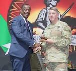 Maj. Gen. Todd Hunt, the adjutant general of North Carolina, joins Kristi Jones, chief of staff for the North Carolina governor’s office; the Honorable Ambrose Lwizhi Lufuma, member of Parliament, minister of defence, Republic of Zambia; and Honorable Jack Mwiimbu, SC, member of Parliament, minister of home affairs and internal security for a State Partnership Program signing ceremony in Livingstone, Zambia, April 26, 2024.