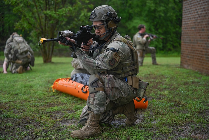 An Airman watches over a patient