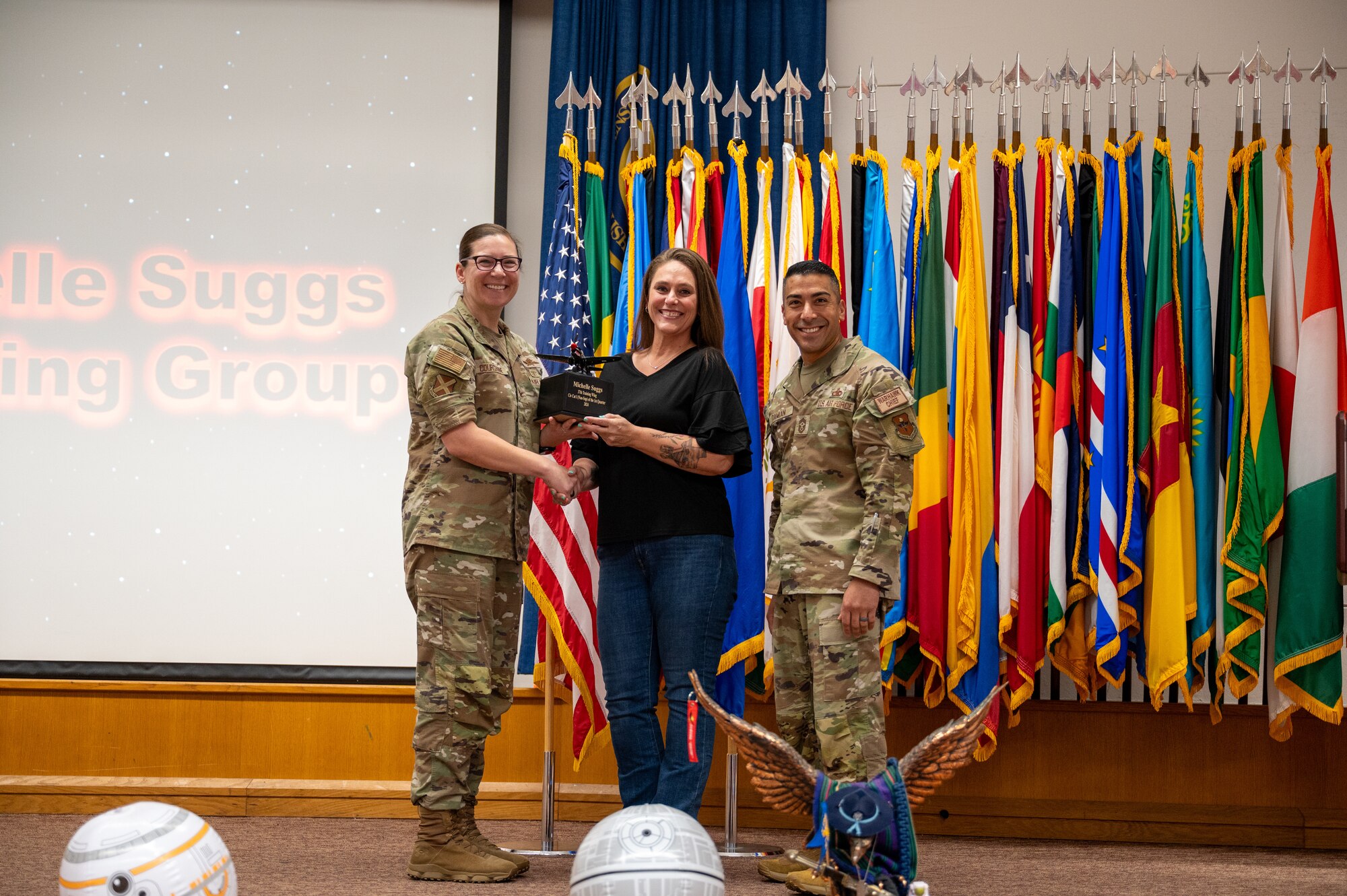 The 37th Training Wing Commander Colonel Lauren Courchaine presents members of the 37th Training Wing with a first quarter award on May 3, 2024. Members from the 37th Training Group, Inter-American Air Forces Academy, 637th Training Group and 737th Training Group were represented during the award ceremony. (U.S. Air Force photo by 2nd Lt. Kate Anderson)