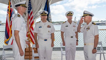 PEARL HARBOR (Nov. 21, 2023) — Cmdr. Daniel Jones, incoming commanding officer of the Virginia-class fast-attack submarine USS Hawaii (SSN 776), right, assumes command from Cmdr. Preston Gilmore, off-going commanding officer of Hawaii, left, during the change of command ceremony for the Hawaii, which was held on the fantail of the Battleship Missouri Memorial, Nov. 21, 2023, in Pearl Harbor. Hawaii performs a full spectrum of operations, including anti-submarine and anti-surface warfare. (U.S. Navy photo by Mass Communication Specialist 1st Class Scott Barnes)