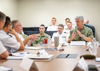 JOINT BASE PEARL HARBOR-HICKAM (April 10, 2024) — Commander, U.S. Pacific Fleet, Adm. Stephen Koehler, left, speaks with Commander, Submarine Force U.S. Pacific Fleet, Rear Adm. Rick Seif during the Undersea Warfare Commanders’ Conference (USWCC) on Joint Base Pearl Harbor-Hickam, April 10, 2024. First held in 2018, this year’s theme was “Leveraging technology to integrate partners and improve communications, lethality and interchangeability.” (U.S. Navy photo by Mass Communication Specialist 1st Class Scott Barnes)