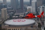 Coast Guard Air Station Houston performs an area of responsibility formation flight over the Toyota Center in Houston, Texas, March 11, 2022. The air station regularly conducts AOR runs to keep crews familiar with the area. (U.S. Coast Guard photo by Petty Officer 3rd Class Alejandro Rivera)