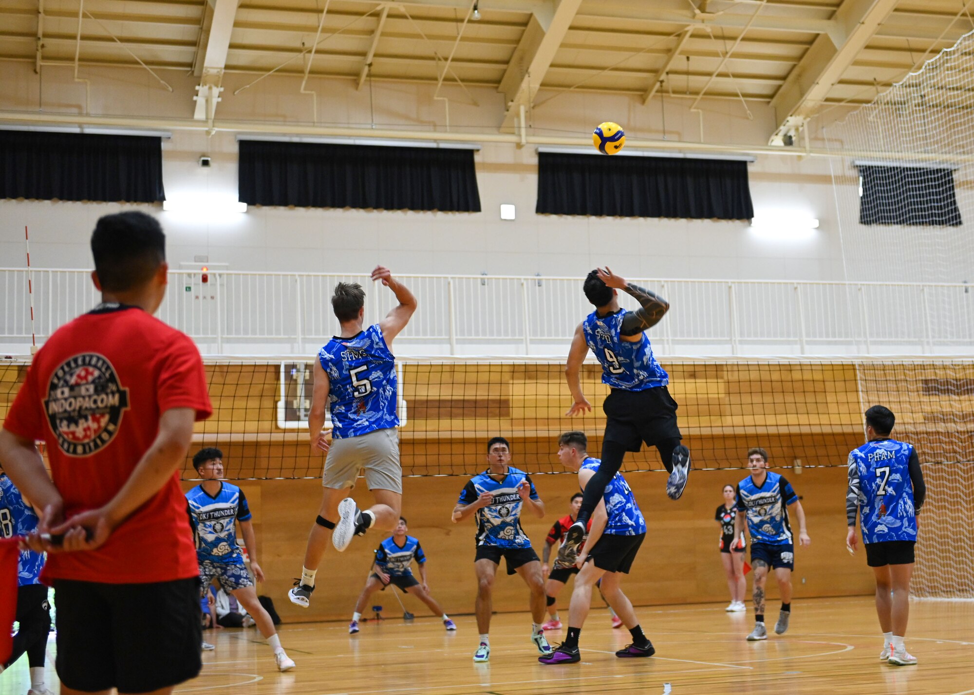 Osan Air Base Varsity Volleyball members on Osan S1 compete at the 2024 INDOPACOM Volleyball Tournament at Yokota AB, Japan, April 27, 2024. Osan AB Varsity Volleyball formed two men’s teams, Osan S1 and Osan S2, that competed in the tournament. Osan S1 placed third out of the eight men's teams within the tournament. (U.S. Air Force photo by Staff Sgt. Aubree Owens)