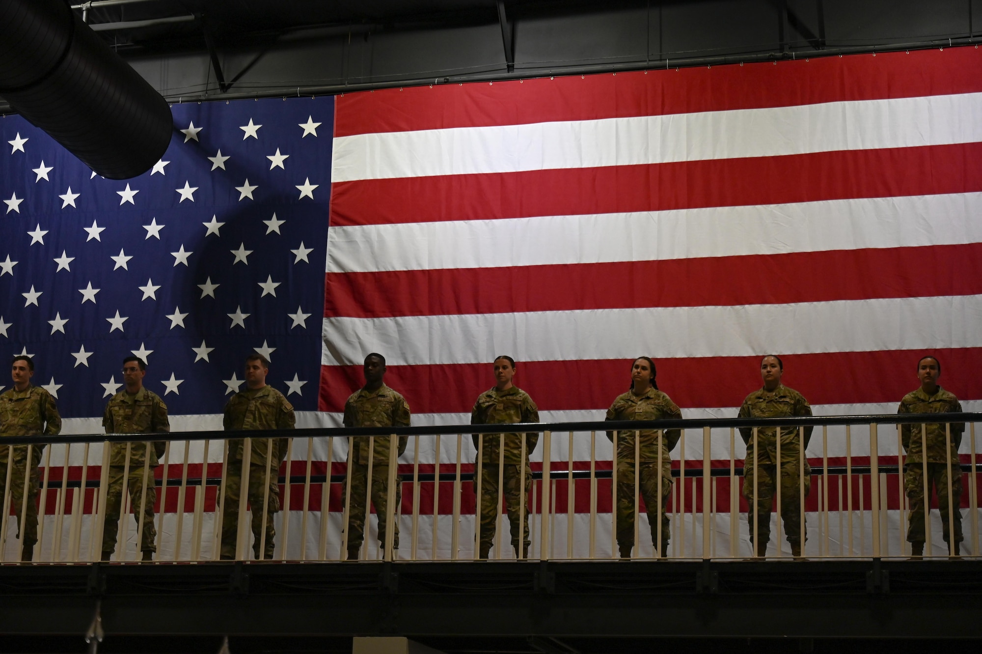 Airmen from the 388th Electronic Warfare Squadron stand at attention during the 388th EWS reactivation ceremony at the U.S. Air Force Armament Museum, Eglin Air Force Base, Florida, May 2, 2024. The 388th EWS will serve to provide the 350th Spectrum Warfare Wing with education and training, weapons and tactics, intelligence support and test management in support of Electromagnetic Spectrum Operations. (U.S. Air Force photo by Capt. Benjamin Aronson)