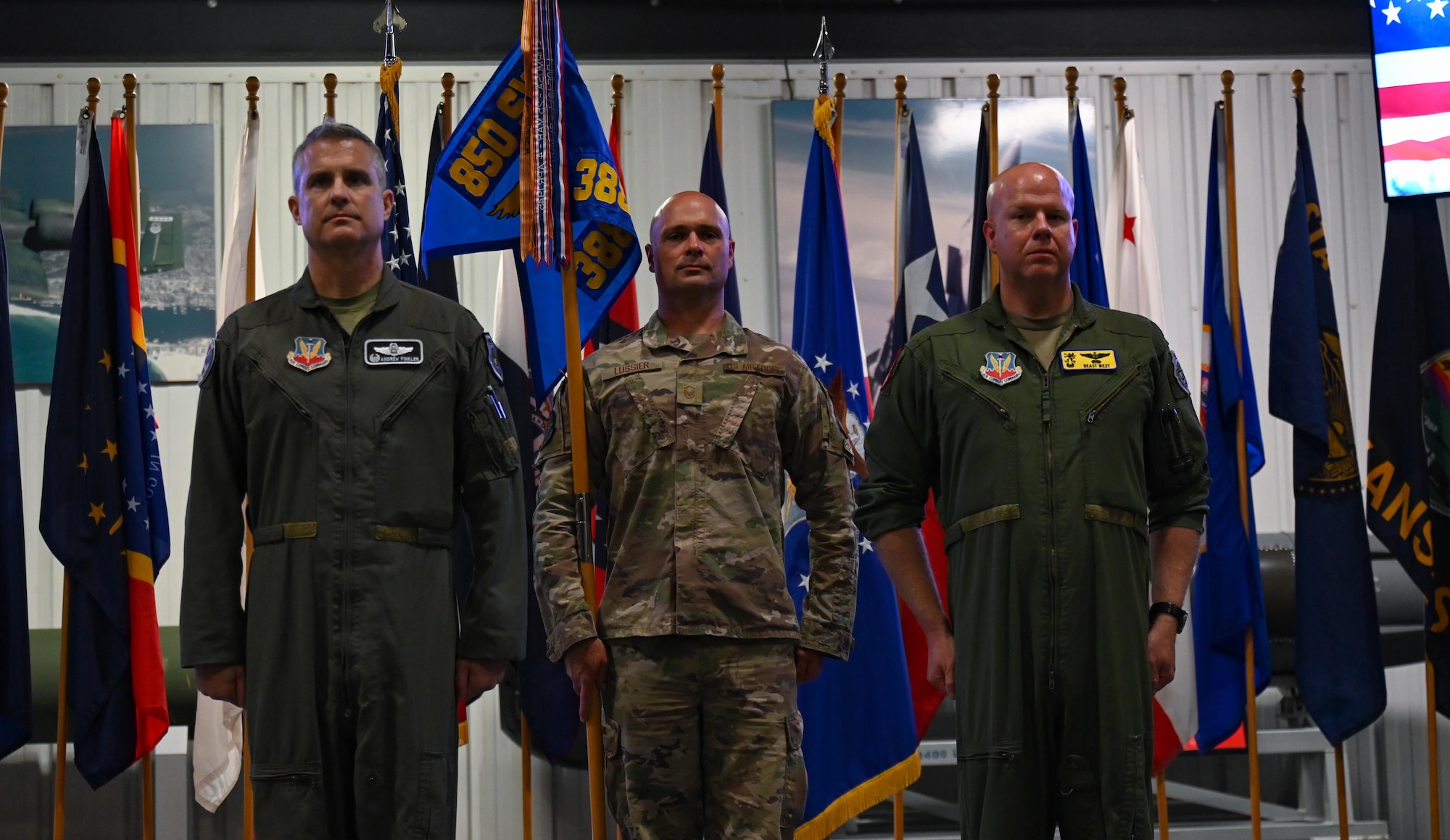 U.S. Air Force Col. Andrew Finkler, 850th Spectrum Warfare Group commander, left, Master Sgt. Tyler Lussier, 388th Electronic Warfare Squadron senior enlisted leader, center, and Lt. Col. Timothy West, 388th EWS commander, right, participate in a reactivation ceremony and assumption of command at the U.S. Air Force Armament Museum, Eglin Air Force Base, Florida, May 2, 2024. The 388th EWS previously served as the 388th Electronic Combat Squadron and operated the EA-6B Growler, before being deactivated in 2010. (U.S. Air Force photo by Capt. Benjamin Aronson)