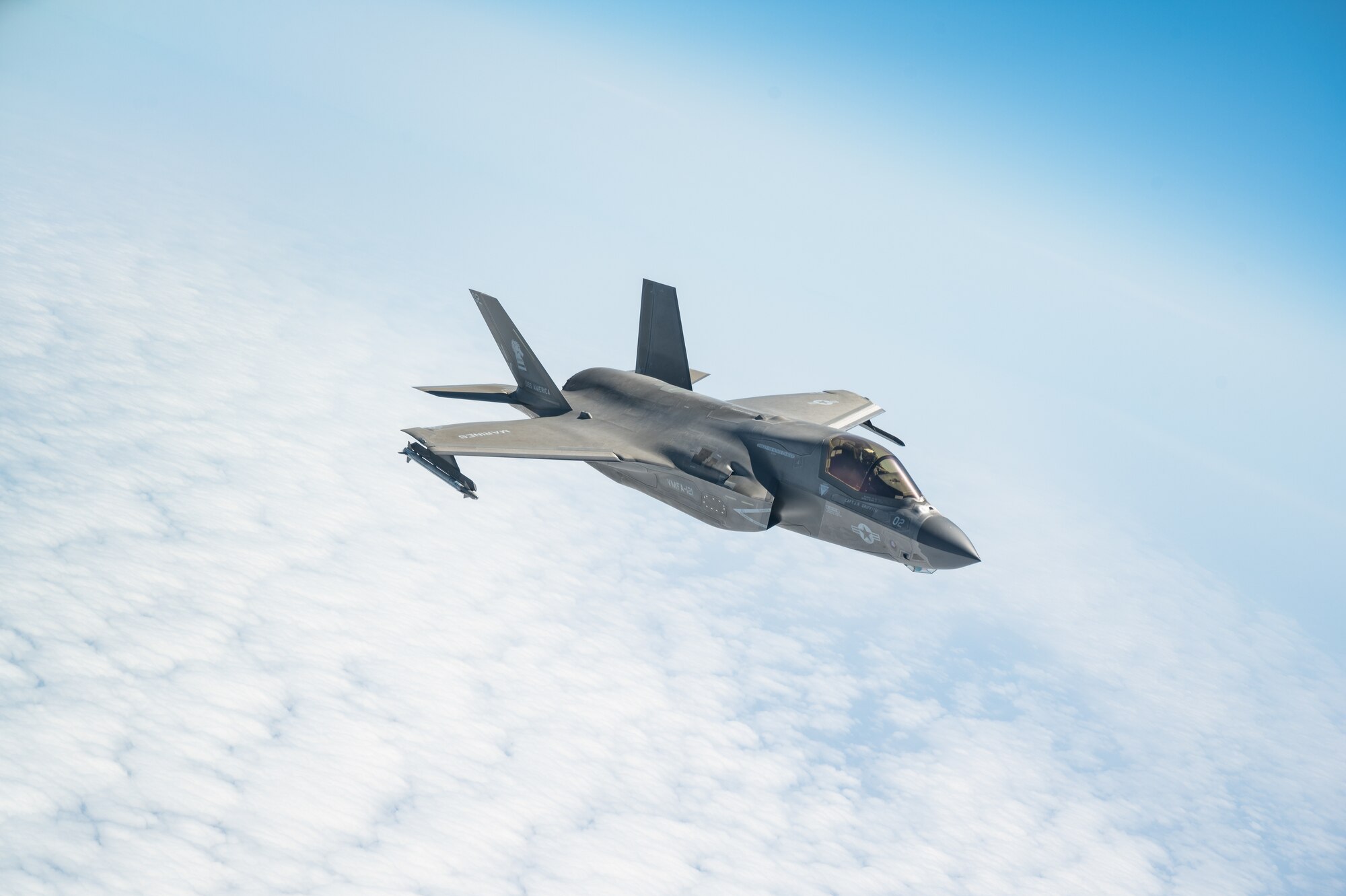A U.S. Marine Corps F-35B Lightning II assigned to Marine Fighter Attack Squadron 121, Marine Corps Air Station Iwakuni, Japan, flies to the wing of a KC-135 Stratotanker assigned to the 909th Air Refueling Squadron, Kadena Air Base, Japan, after conducting aerial refueling during Korea Flying Training 24 over the Republic of Korea, April 25, 2024.