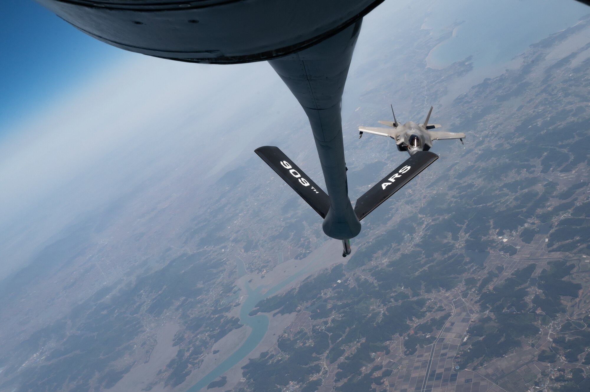 A U.S. Marine Corps F-35B Lightning II  assigned to Marine Fighter Attack Squadron 121, Marine Corps Air Station Iwakuni, Japan, approaches a KC-135 Stratotanker assigned to the 909th Air Refueling Squadron, Kadena Air Base, Japan, to conduct aerial refueling during Korea Flying Training 24 over the Republic of Korea, April 25, 2024.