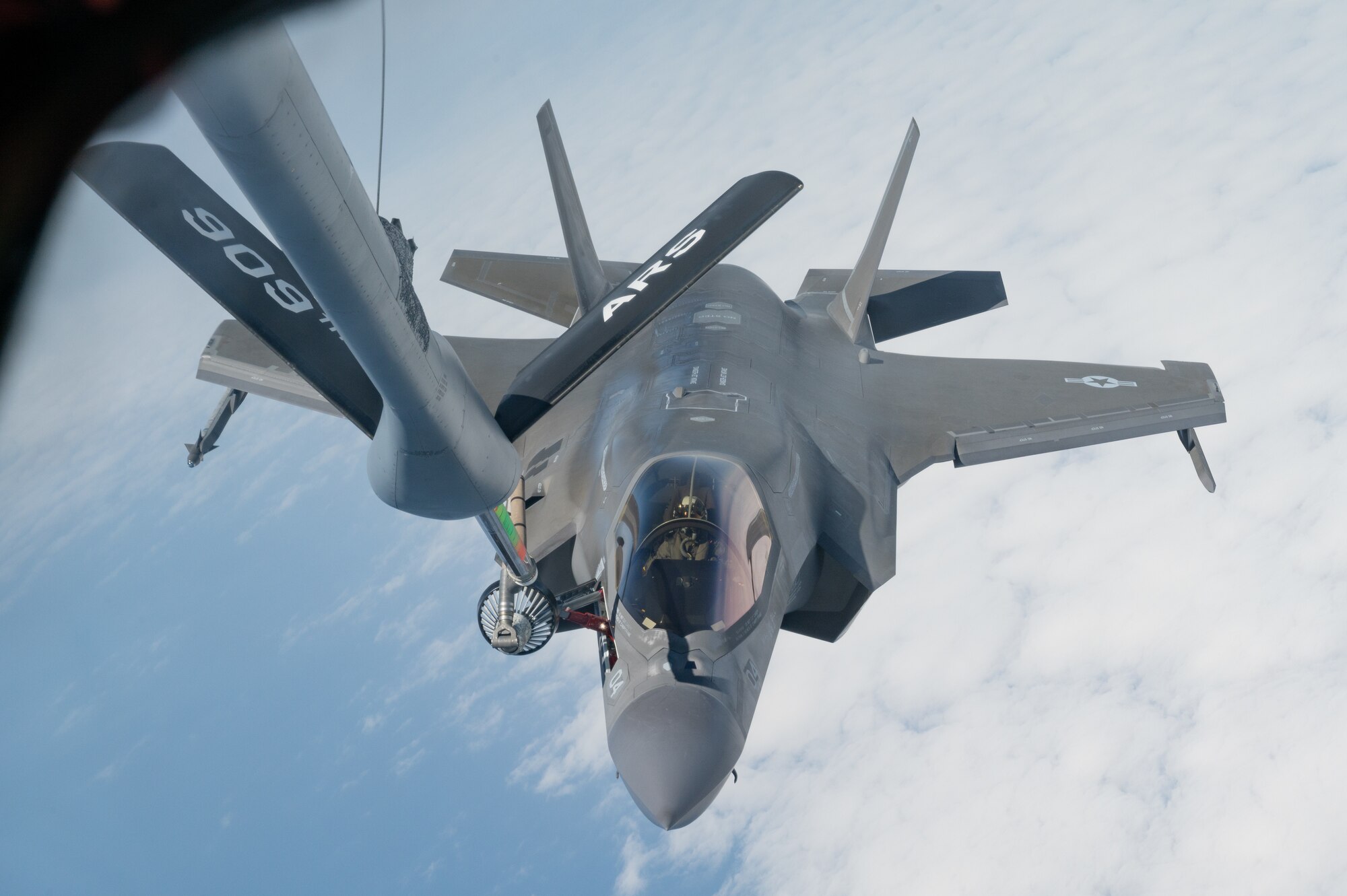 A U.S. Marine Corps F-35B Lightning II assigned to Marine Fighter Attack Squadron 121, Marine Corps Air Station Iwakuni, Japan, conducts aerial refueling with a KC-135 Stratotanker assigned to the 909th Air Refueling Squadron, Kadena Air Base, Japan, during Korea Flying Training 24 over the Republic of Korea, April 25, 2024.