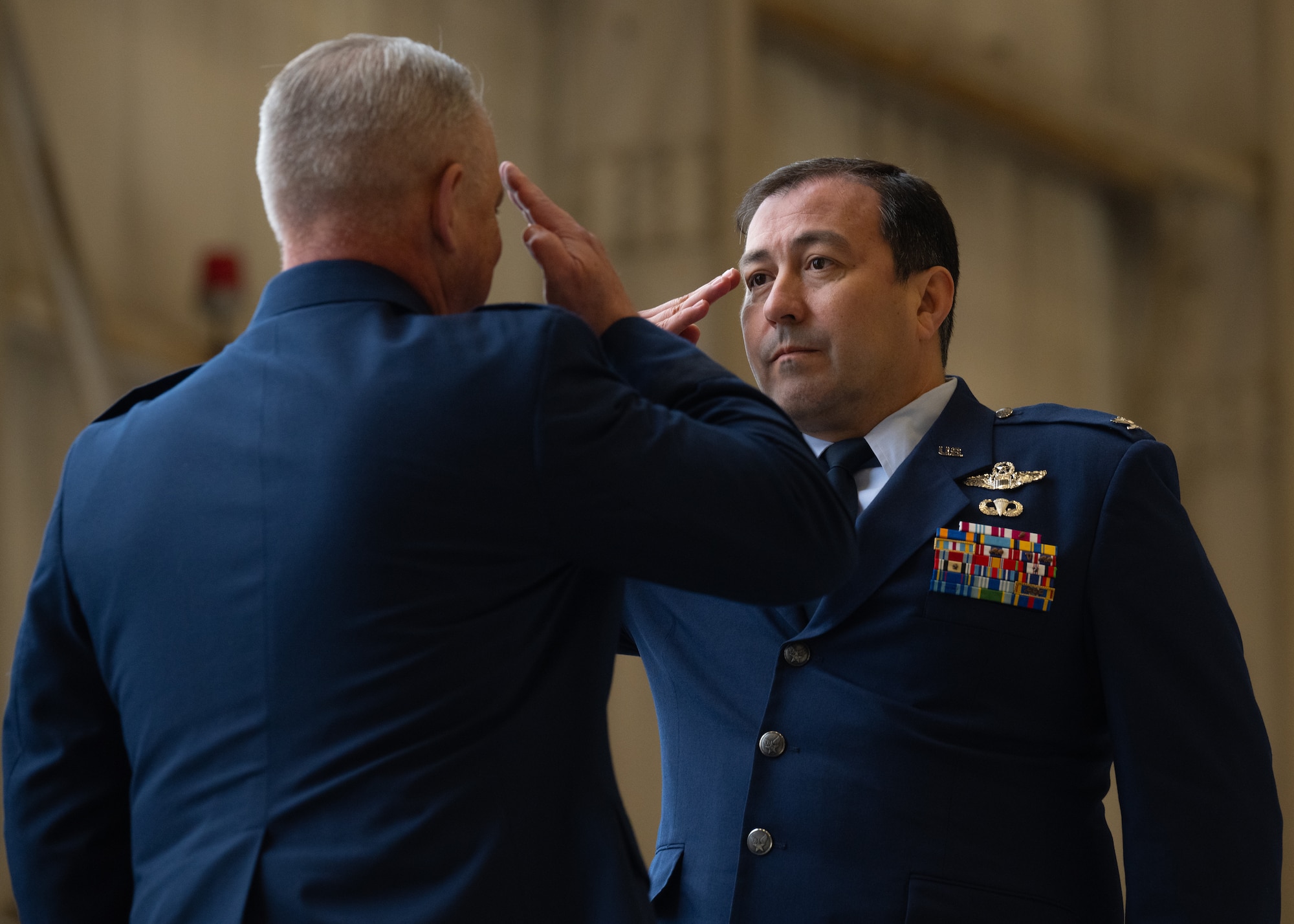 Col. Eric J. Rivero salutes Maj. Gen. D. Scott Durham, 4th Air Force commander, March Air Force Base, California, during his assumption of command ceremony on Dover Air Force Base, Delaware, May 4, 2024.