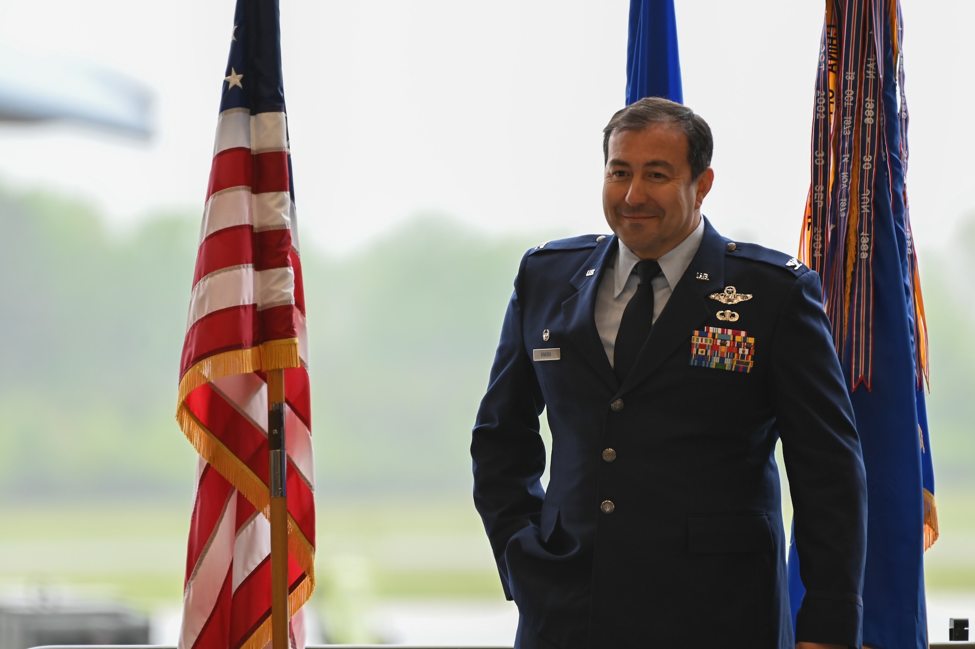 Col. Eric J. Rivero speaks to members of the 512th Airlift Wing during his assumption of command ceremony on Dover Air Force Base, Delaware, May 4, 2024.