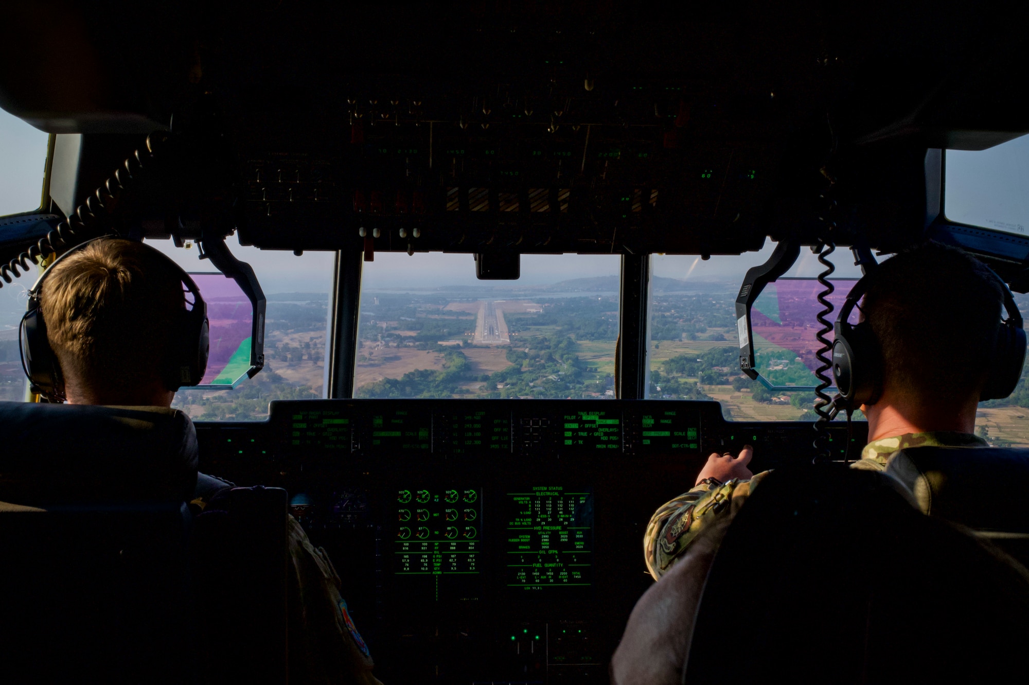 U.S. Air Force Capt. Eric Albers and Capt. Blayne Hayes, both 40th Airlift Squadron, begin landing a C-130J Hercules during Exercise Balikatan 24 near Lal-Lo Airfield, Philippines.