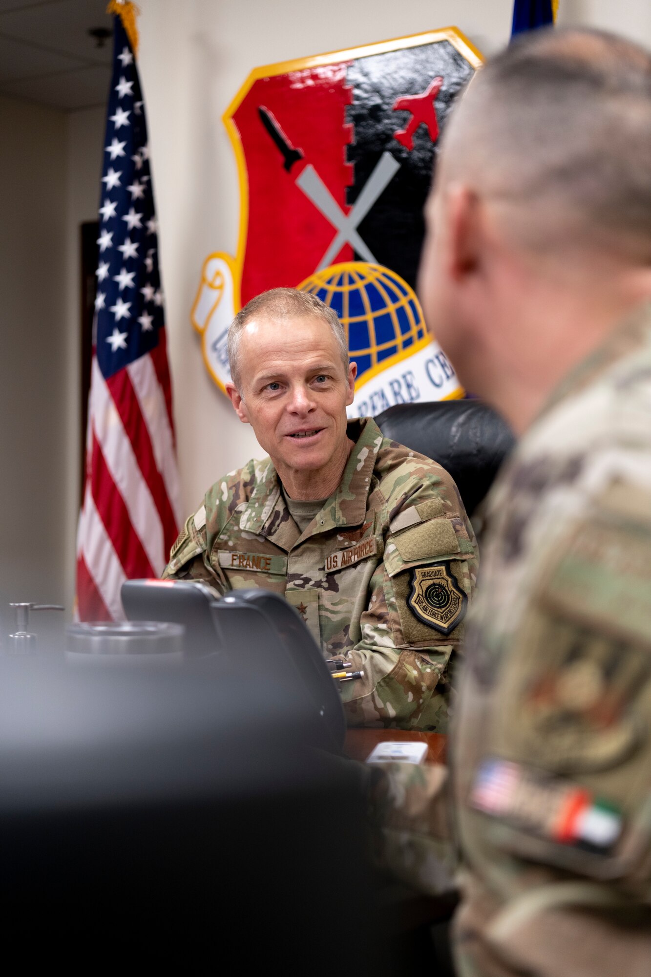 U.S. Air Force Lt. Gen. Derek France, of Ninth Air Force commander, speaks with members of the Air Forces Central Air Warfare Center during a visit to an undisclosed location within the U.S. Central Command area of responsibility, April 29, 2024. France, who recently took command of Ninth Air Force, visited the wing to get a better understanding of its current operational capabilities, better enabling him to make informed decisions throughout the region. (U.S. Air Force photo)