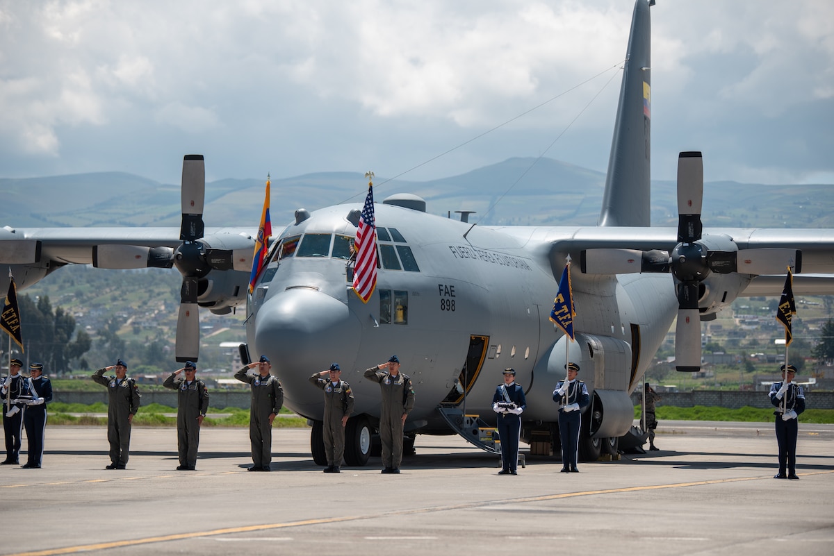 Members of the Ecuadorian Air Force salute during a ceremony welcoming the arrival of a C-130H Hercules to the Ecuadorian Air Force in Latacunga, Ecuador, March 25, 2024. The ceremony, which included top Ecuadorian military and civilian leaders, marked a new milestone in Ecuador’s participation in the National Guard Bureau State Partnership Program, which has paired Ecuador and the Kentucky National Guard for mutual military cooperation. (U.S. Air National Guard photo by Phil Speck)